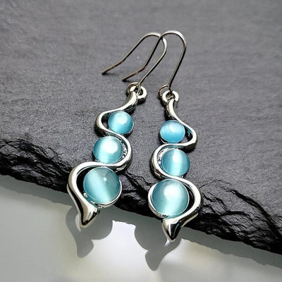 Blauwe kristal dangle oorbellen