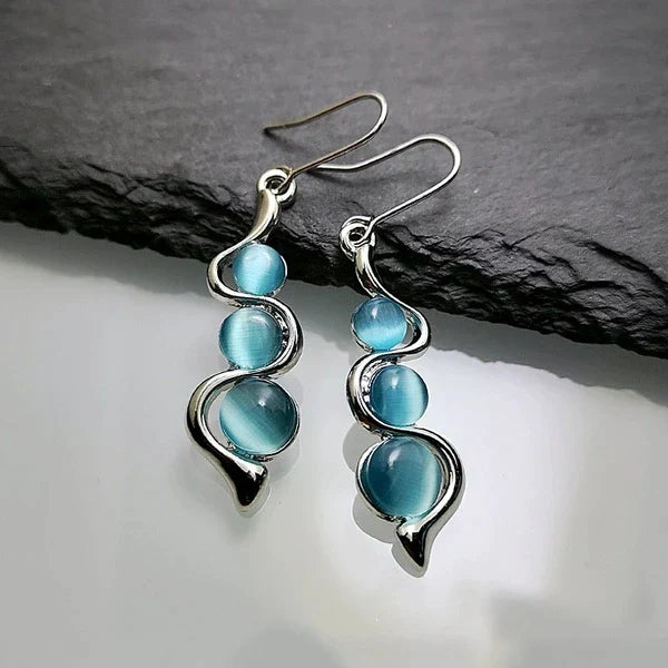 Blauwe kristal dangle oorbellen