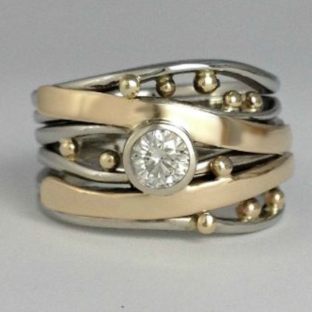 Vintage gouden ring met inlegwerk en zirkonia