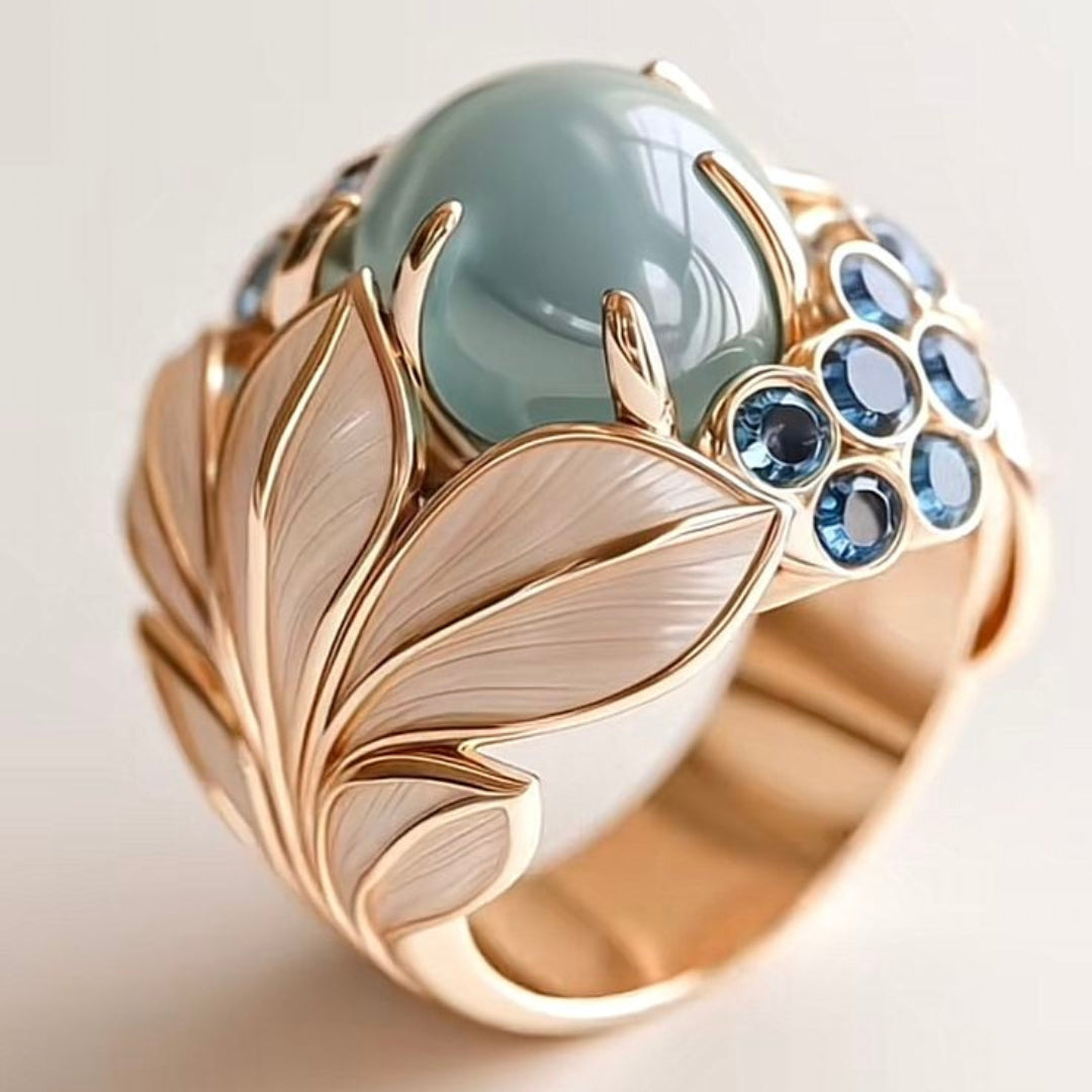 Groene steen gouden blad ring
