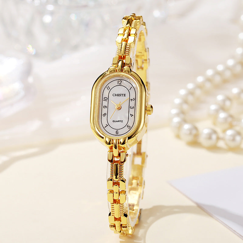 Alira | 18K gouden moment horloge
