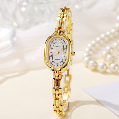 Alira | 18K gouden moment horloge