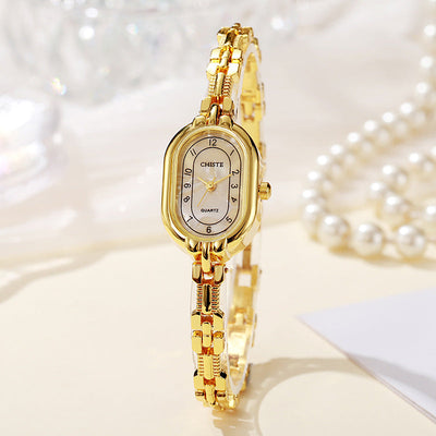 Alira | 18K gouden moment horloge