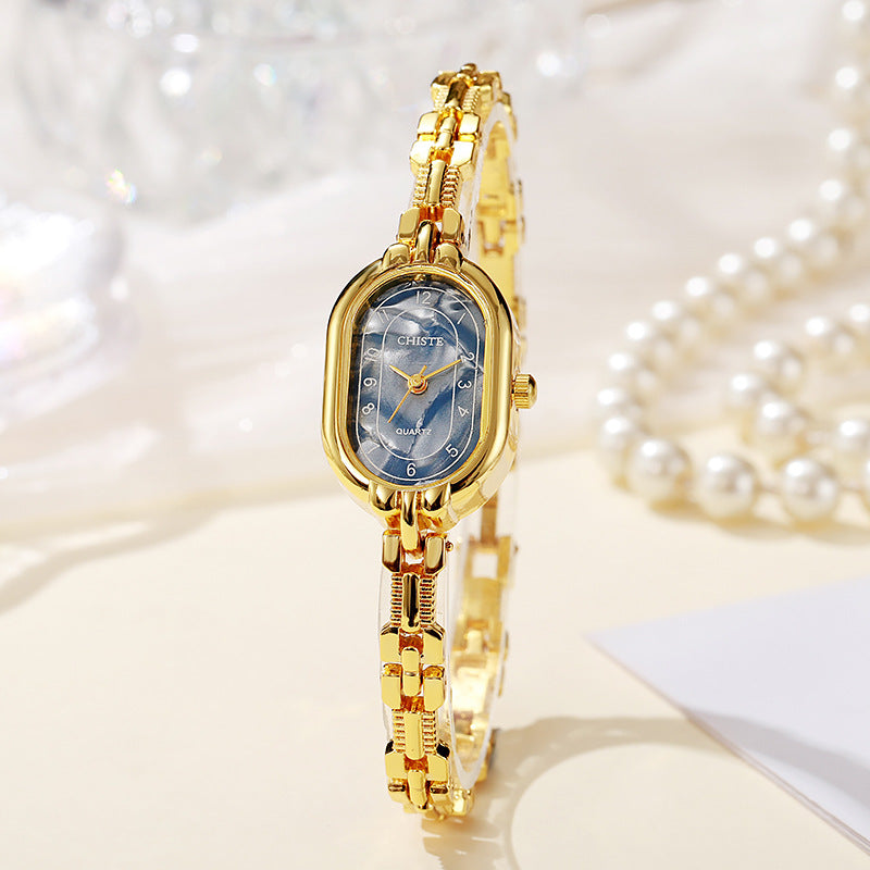 Alira | 18K gouden moment horloge