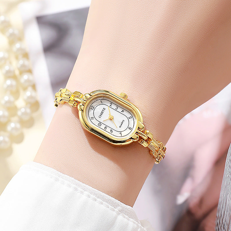Alira | 18K gouden moment horloge
