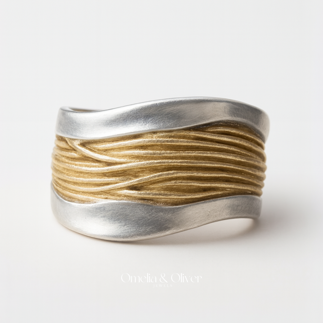 Omelia - De gouden draad ring.