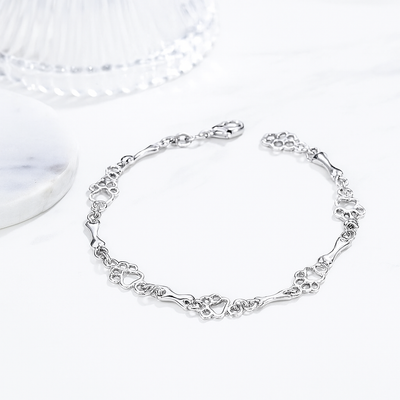 Armband met hondenpoot- en botbedels