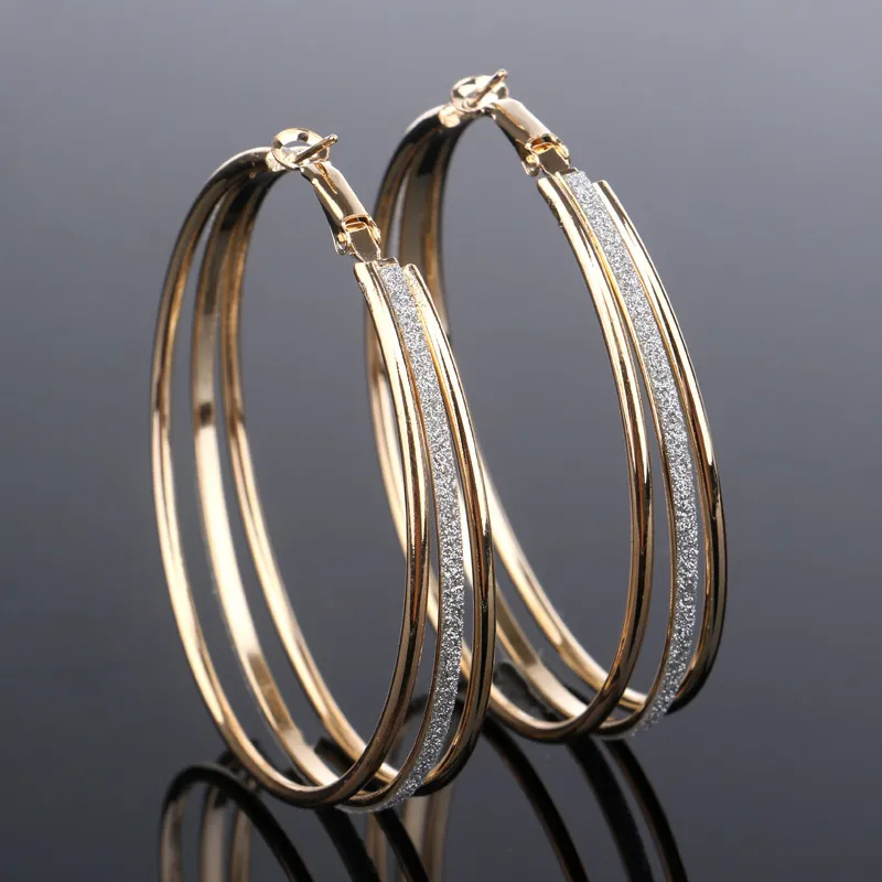 Vintage gouden oorbellen met glans