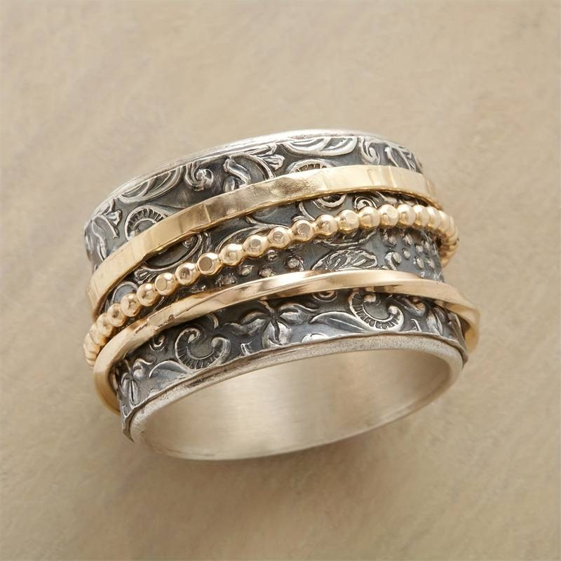 Vintage gouden en zilveren ring.
